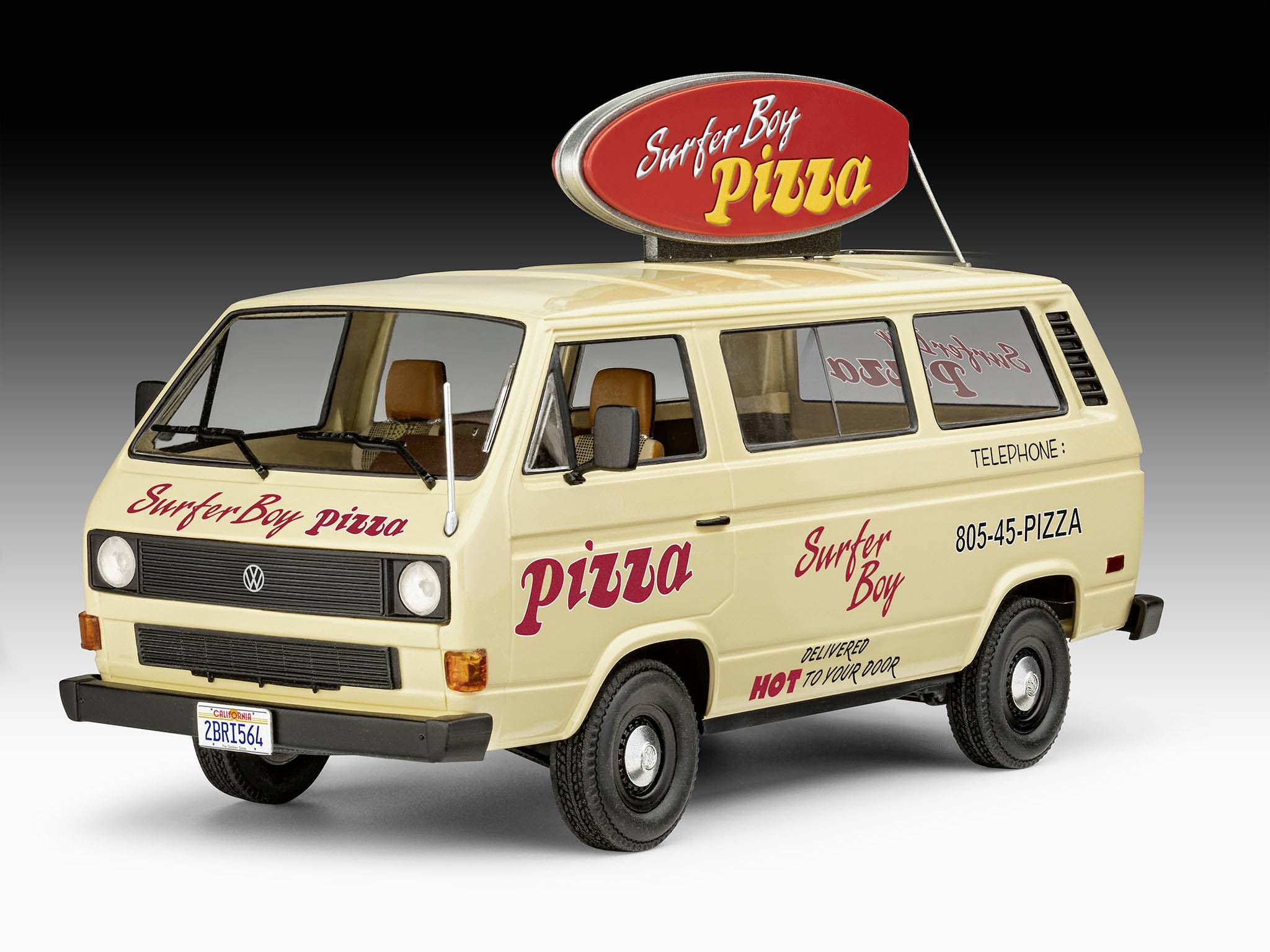 Ein cremefarbener Lieferwagen mit der Aufschrift 'Surfer Boy Pizza'. Die Telefonnummer 805-45-PIZZA ist an der Seite angegeben.