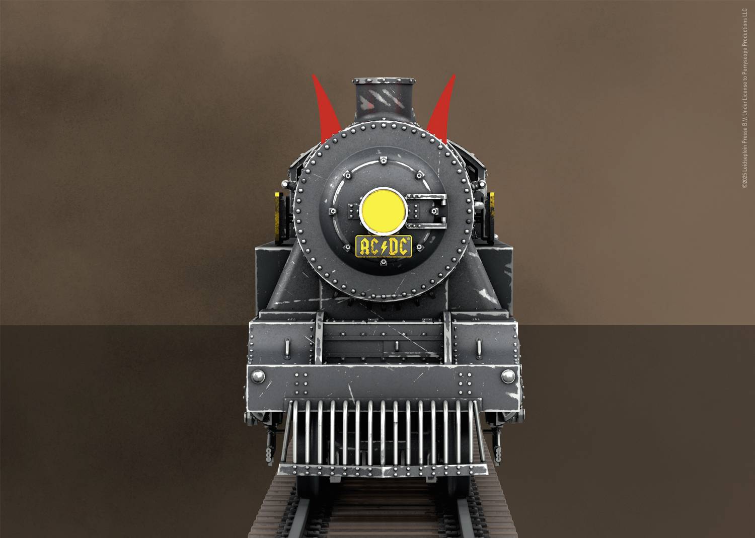 Historische Dampflokomotive von vorne abgebildet mit rotem Teufelshorn-Motiv und dem Schriftzug 'AC-DC' auf der Front.