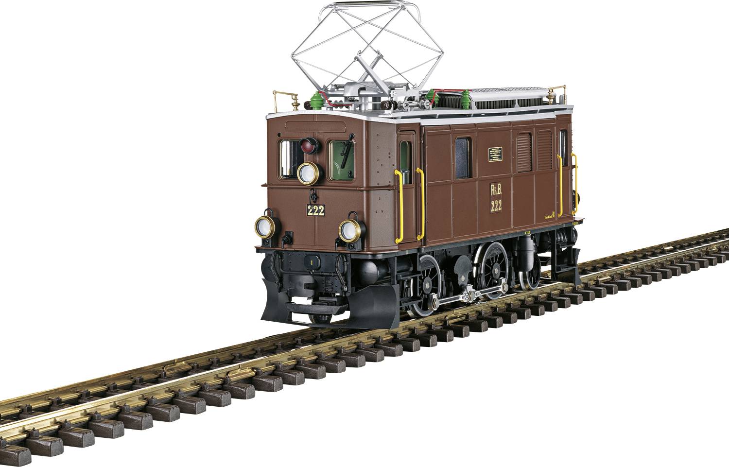 Historische braune Lokomotive auf Schienen, vermutlich aus der frühen Elektrifizierungsepoche, mit markanten runden Scheinwerfern.