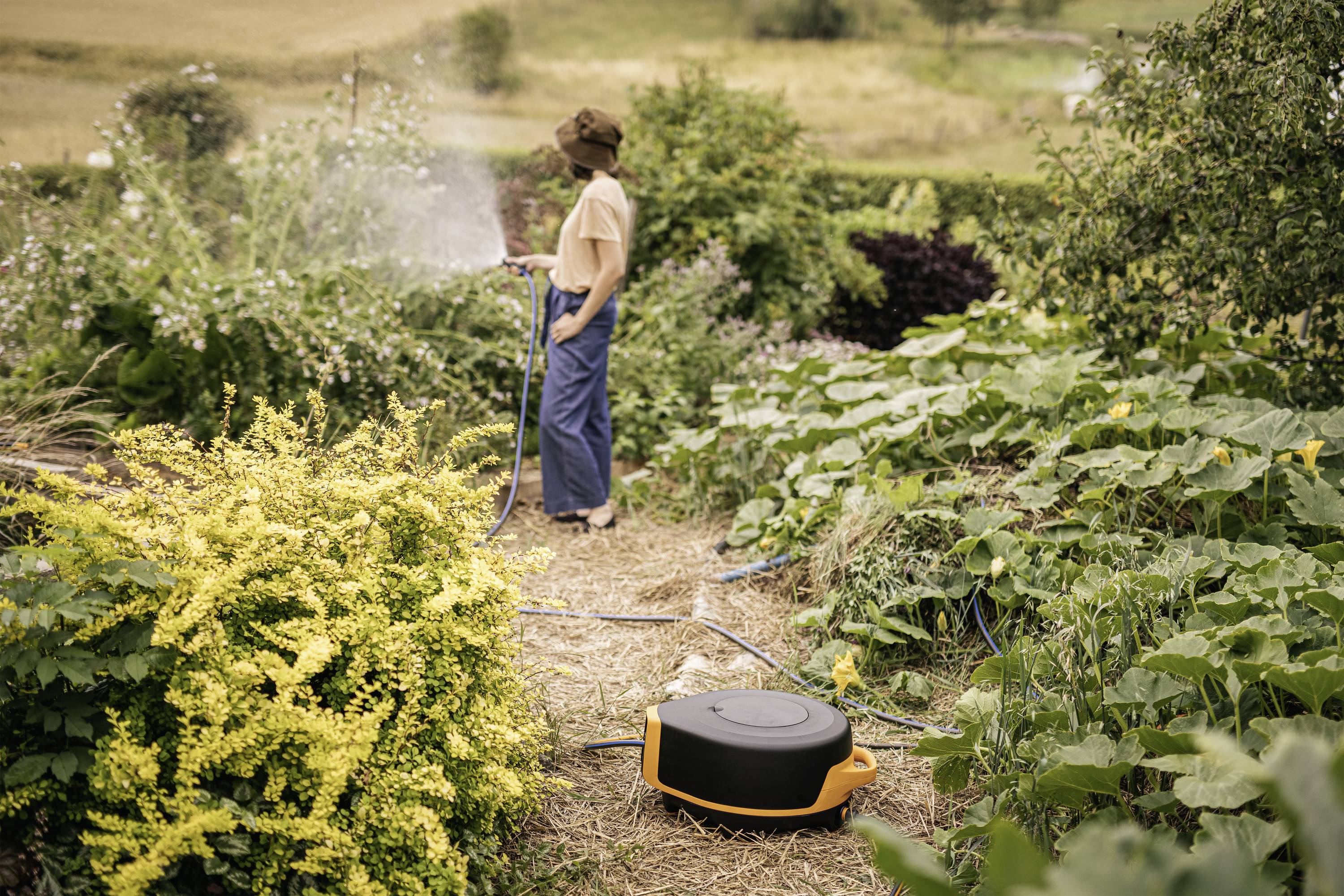 Fiskars 1067549 X-Series™ Waterwheel XL Schlauchtrommel 13mm 25m 1/2 Zoll 1 St. Schwarz, Orange