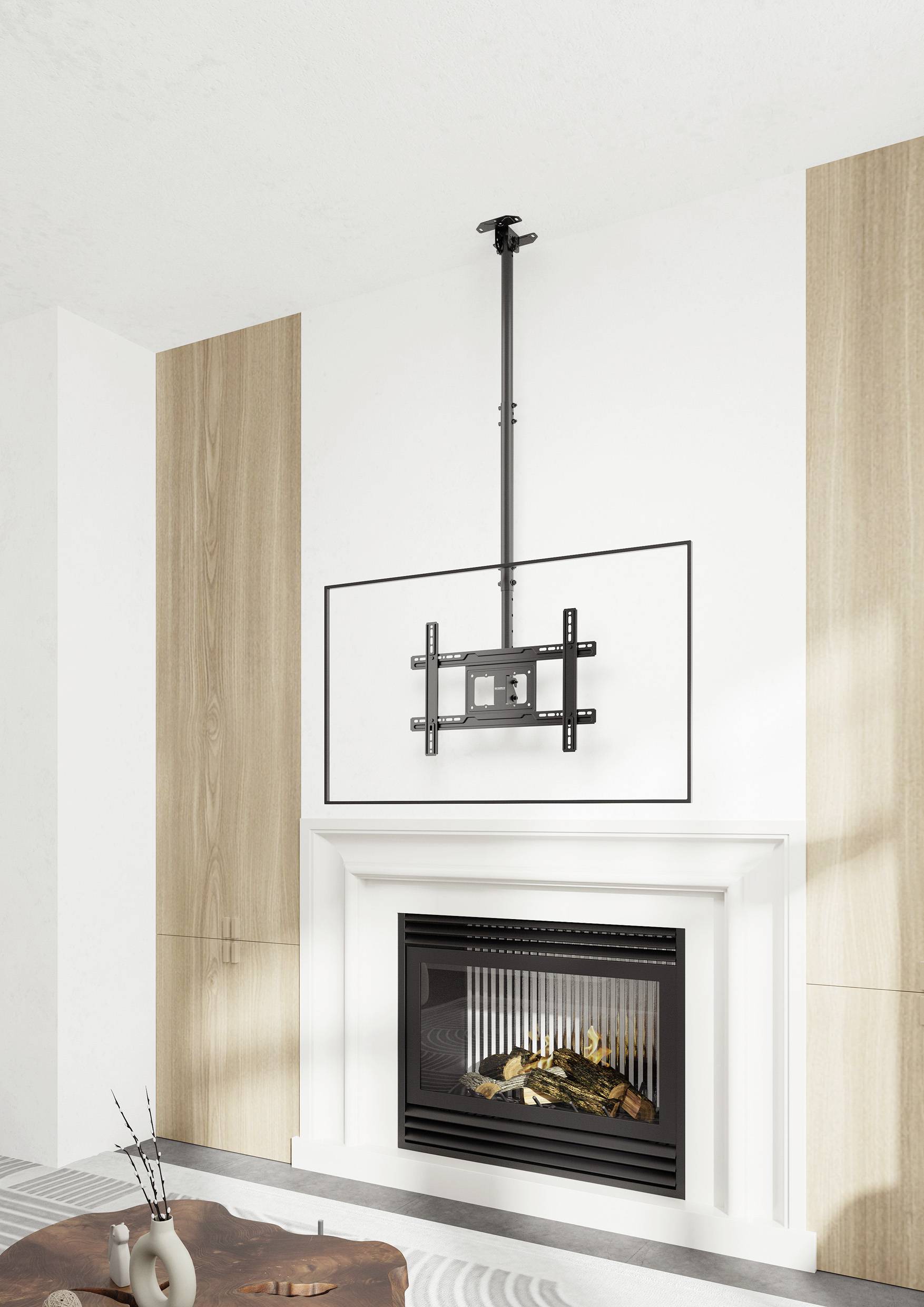 Wandmontierte TV-Halterung über einem modernen Kamin mit hellen Holzpaneelen und einem kleinen runden Holztisch im Vordergrund.