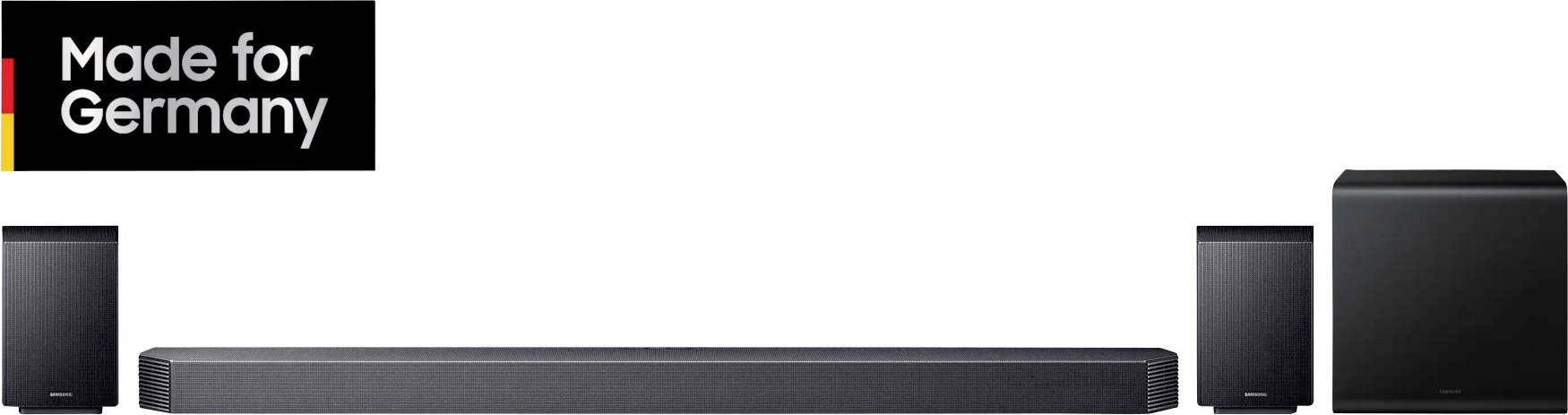 Home-Entertainment-System bestehend aus Soundbar, Subwoofer und zwei Satellitenlautsprechern. Oben links schwarzes Banner 'Made for Germany'.