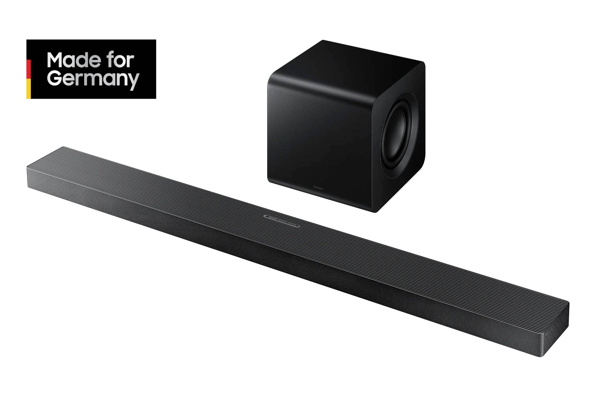 Eine schwarze Soundbar und ein Subwoofer mit der Aufschrift 'Made for Germany' oben links.