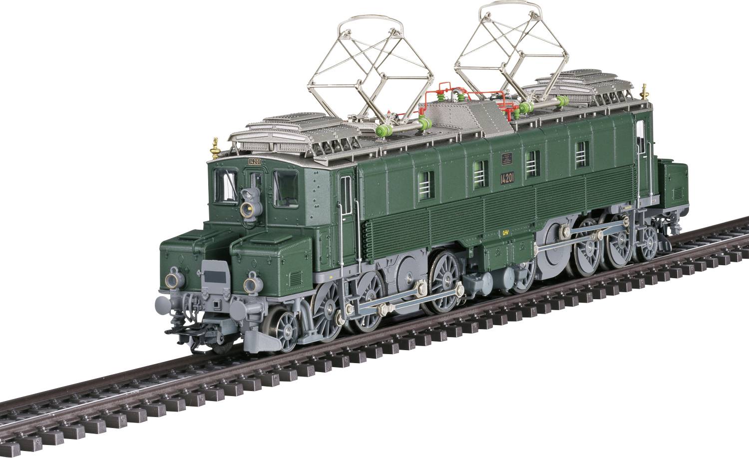 Grünes Modell einer elektrischen Lokomotive mit detaillierter Nachbildung und Metallrädern auf einem Schienenstück.