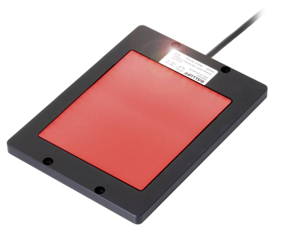 Ein rotes, quadratisches Sensortablett zum Lösen des Bildschirms für Barrierefreiheitstests.