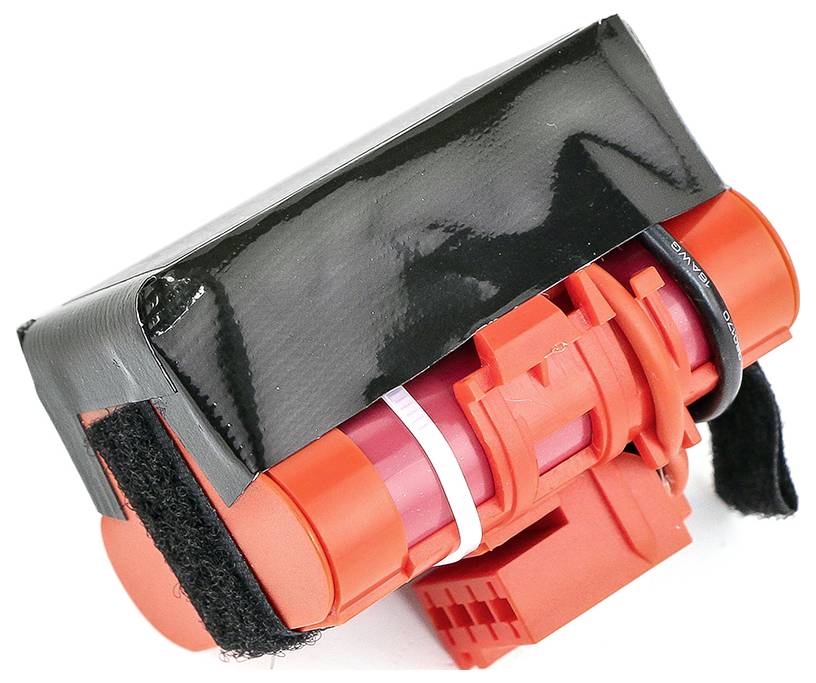 Ein schwarz-rotes Gerät mit einem zylindrischen Körper und Klettverschlüssen, möglicherweise ein Teil eines größeren technischen Systems.