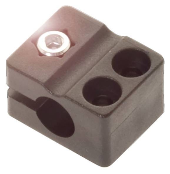 Schwarzes Kunststoffteil mit drei runden Öffnungen, eine Schraube in der oberen linken Öffnung. Verwendet zur Befestigung.