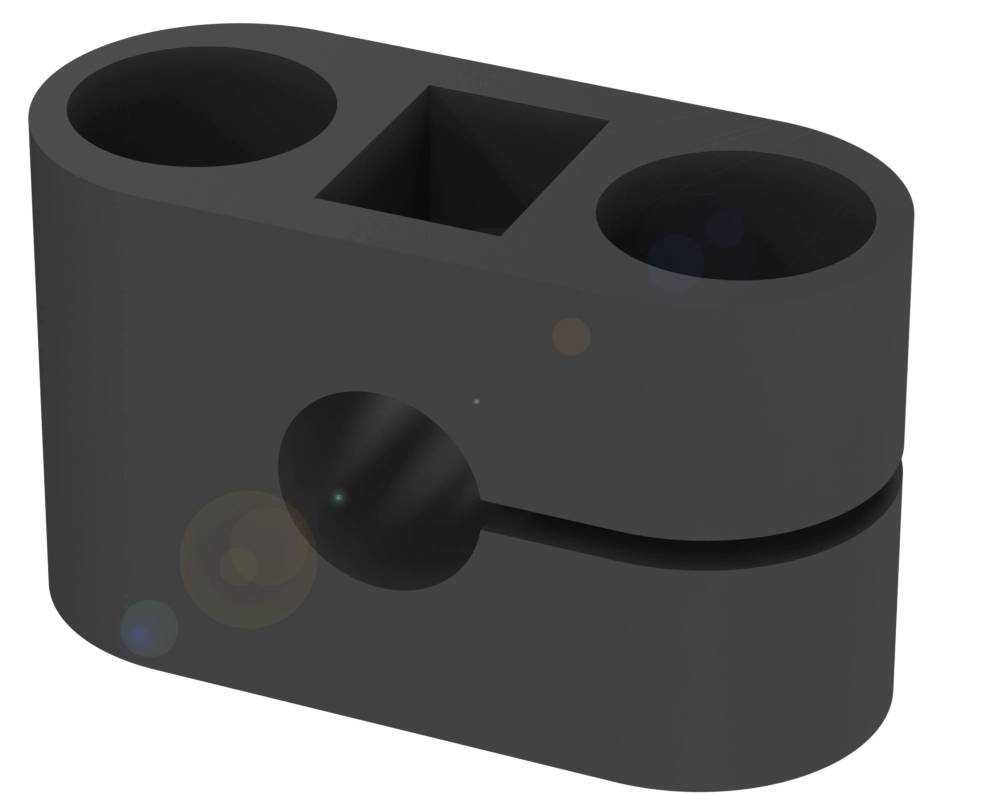 Ein schwarzes, rechteckiges Kunststoffteil mit zwei runden Aussparungen und einer quadratischen Öffnung in der Mitte.