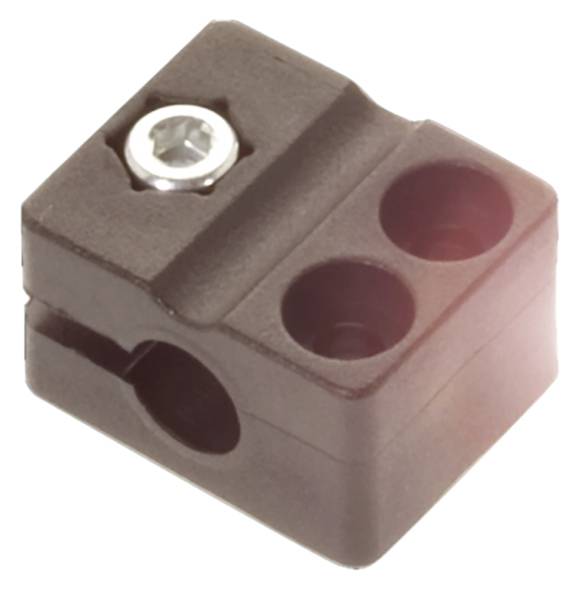 Ein schwarzer Kunststoffblock mit einer silbernen Schraube und zwei runden Löchern, geeignet für elektrische oder mechanische Verbindungen.