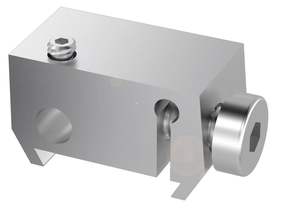 Ein silbernes mechanisches Bauteil mit Schraubmechanismen und Öffnungen, vermutlich ein Teil eines größeren mechanischen Systems.
