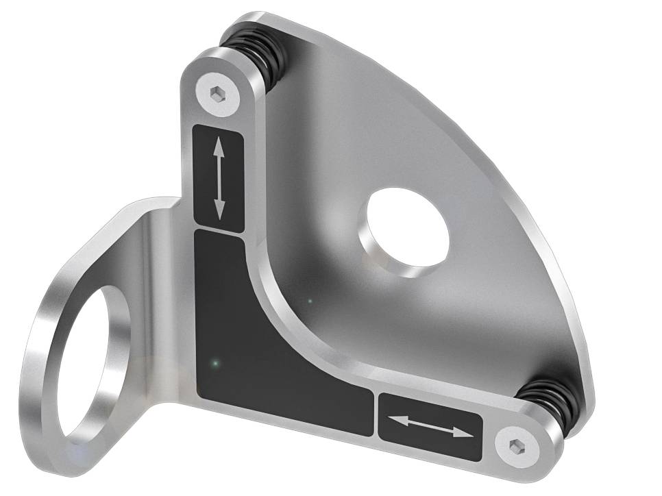 Ein silbernes, metallisches, gebogenes Bauteil mit einem großen runden Loch und schwarzen Pfeilen, die Bewegungsrichtungen anzeigen.