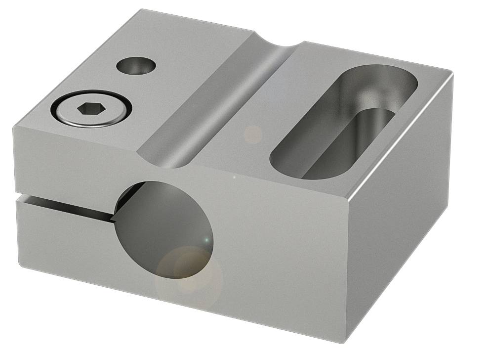 Ein rechteckiger Metallblock mit drei Aussparungen und einer Schraube, möglicherweise ein Maschinenteil oder eine Halterung.