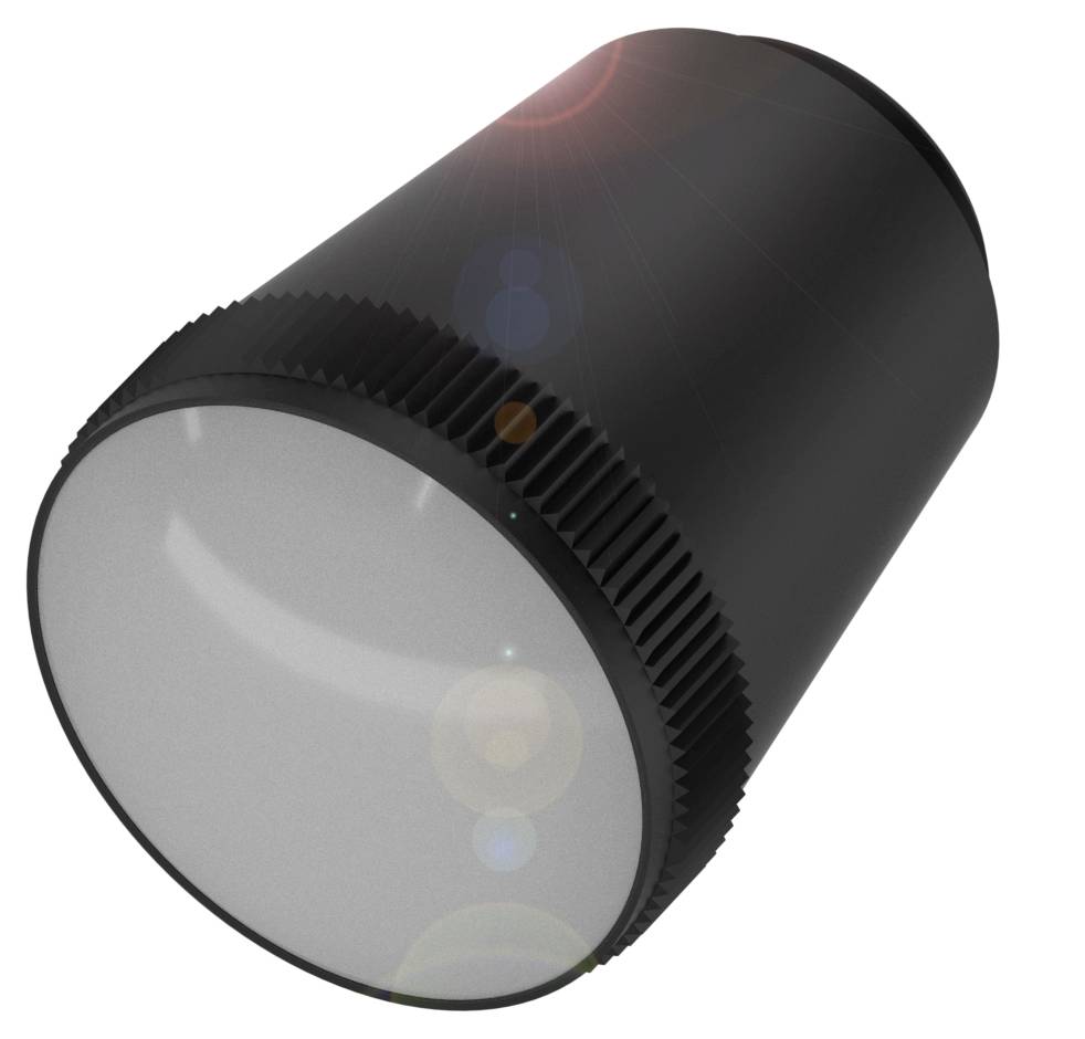 Schwarzes zylinderförmiges Objekt mit glatter, glänzender Oberfläche und leichten Flares, möglicherweise ein technisches Bauteil.