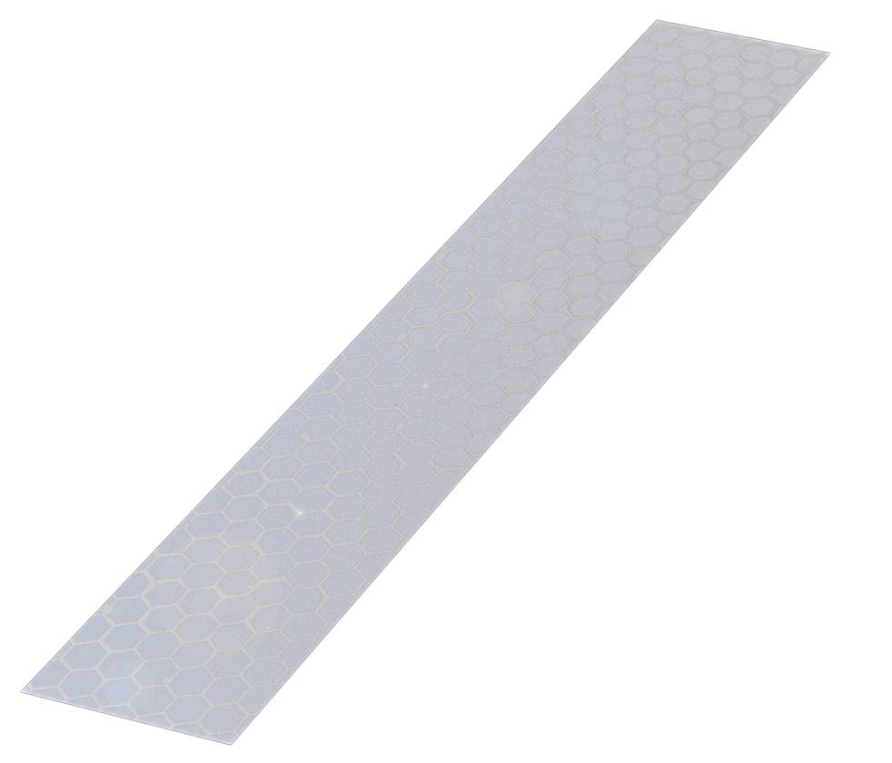 Ein transparentes rechteckiges Stück Kunststoff mit wabenförmigem Muster, das reflektiert.