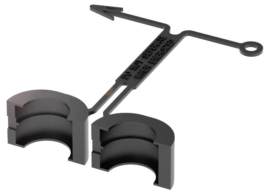 Schwarze Plastikkomponente mit zwei runden Enden und einem Pfeil, darauf steht 'DO NOT OBSERVE WASH ENGINEER'.