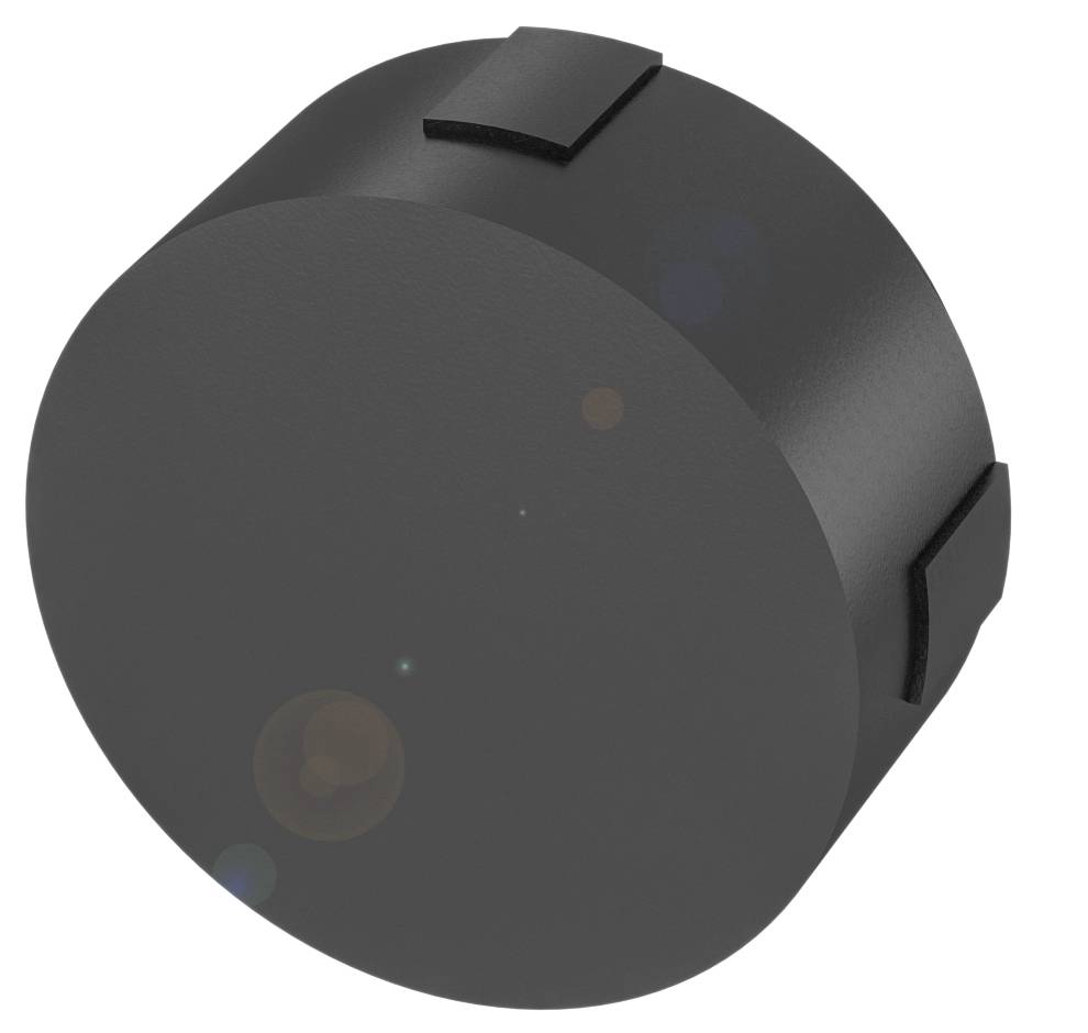 Ein schwarzer zylindrischer Gegenstand mit abgerundeten Kanten und drei gleichmäßig verteilten, flachen Griffen an der Seite.