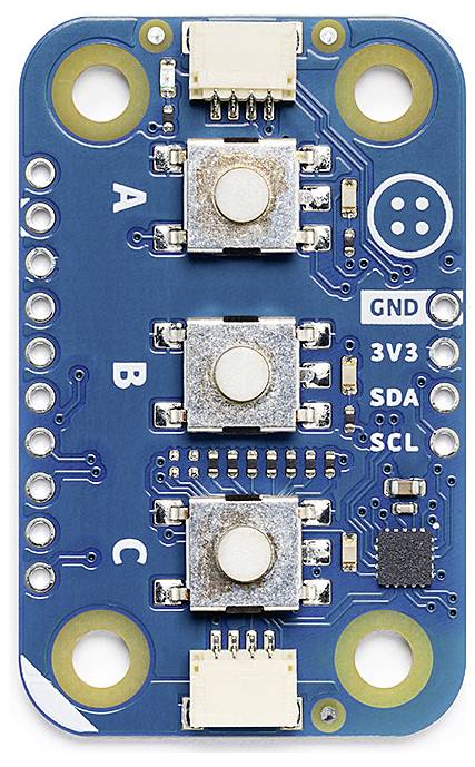 Ein blaues elektronisches Modul mit drei quadratischen Sensoren, beschriftet mit 'A', 'B', 'C'. Anschlüsse: GND, 3V3, SDA, SCL.