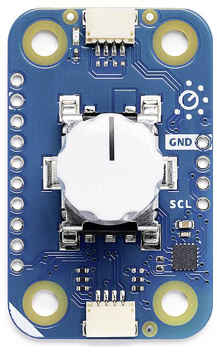 Eine blaue elektronische Platine mit mehreren Anschlüssen und einem zentralen weißen Drehknopf. Verbindungsstellen sind markiert.