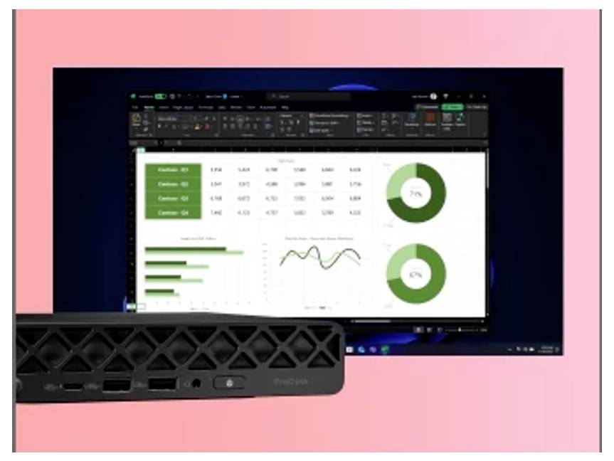 Ein Computerbildschirm zeigt eine Tabellenkalkulation mit Grafiken, die Prozentsätze und Datentrends darstellen. Ein drahtloser Router befindet sich im Vordergrund.