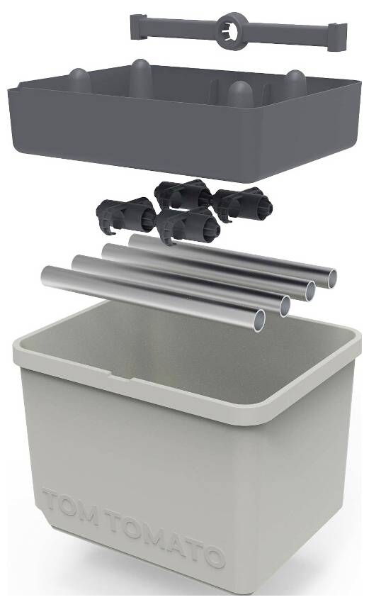 Explosionszeichnung eines Pflanzkastens: Oberteil mit Bewässerungsfunktion, vier Röhren, Steckverbinder und Unterteil mit Aufschrift 'TOM TOMATO'.
