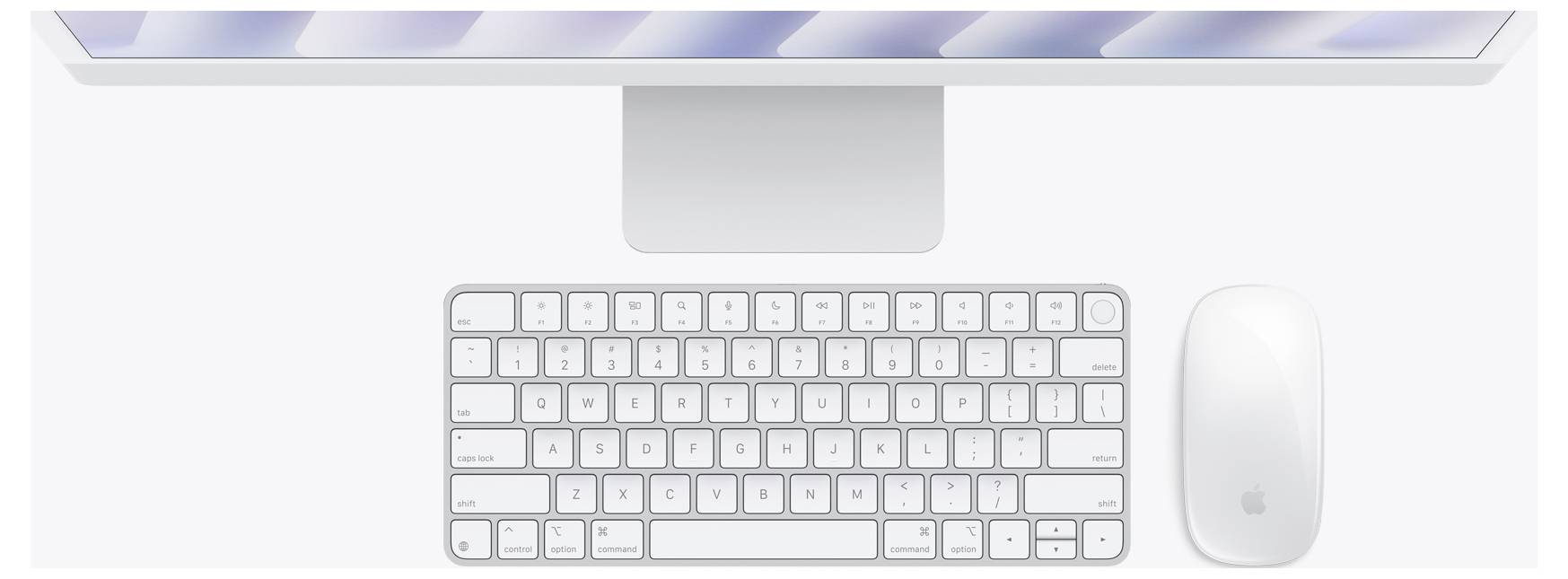 Ein schlankes Desktop-Setup mit einem dünnen Monitor, minimalistischer Tastatur und einer weißen Maus, das ein klares, modernes Design betont.