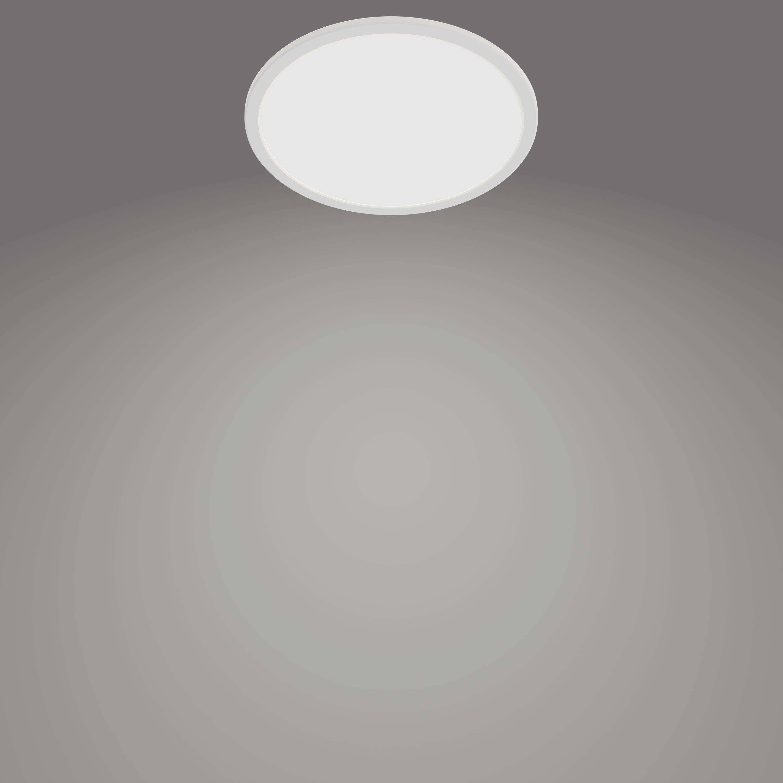 Eine runde Deckenleuchte leuchtet einen grauen Raum sanft aus.