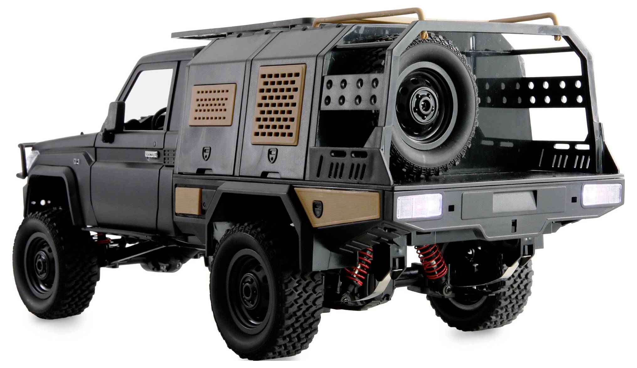 Ein robustes graues Offroad-Fahrzeug mit gepanzerter Rückseite und Reserverad, geeignet für unwegsames Gelände.