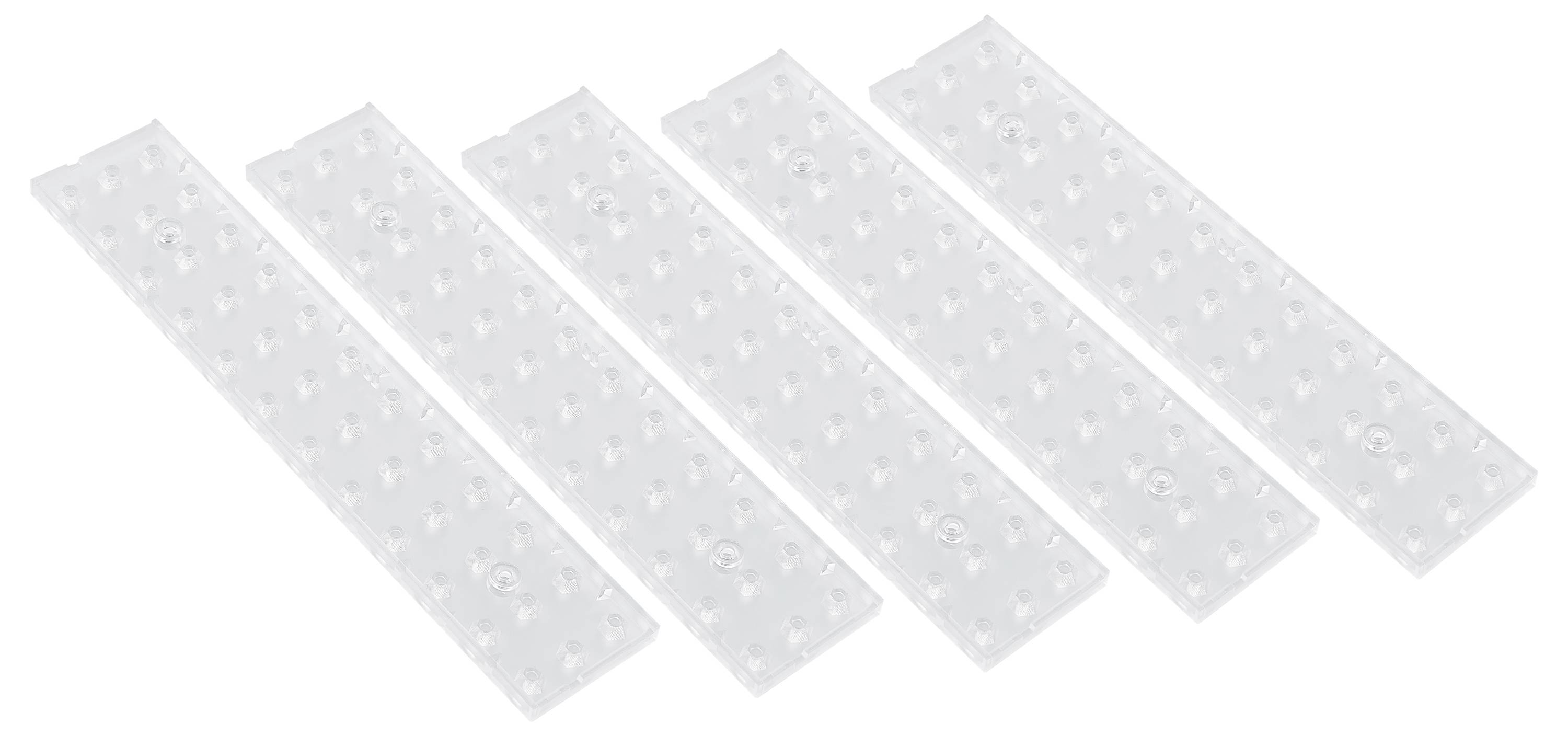 Fünf transparente Plastikstreifen mit Zacken, gleichmäßig angeordnet auf weißem Hintergrund.