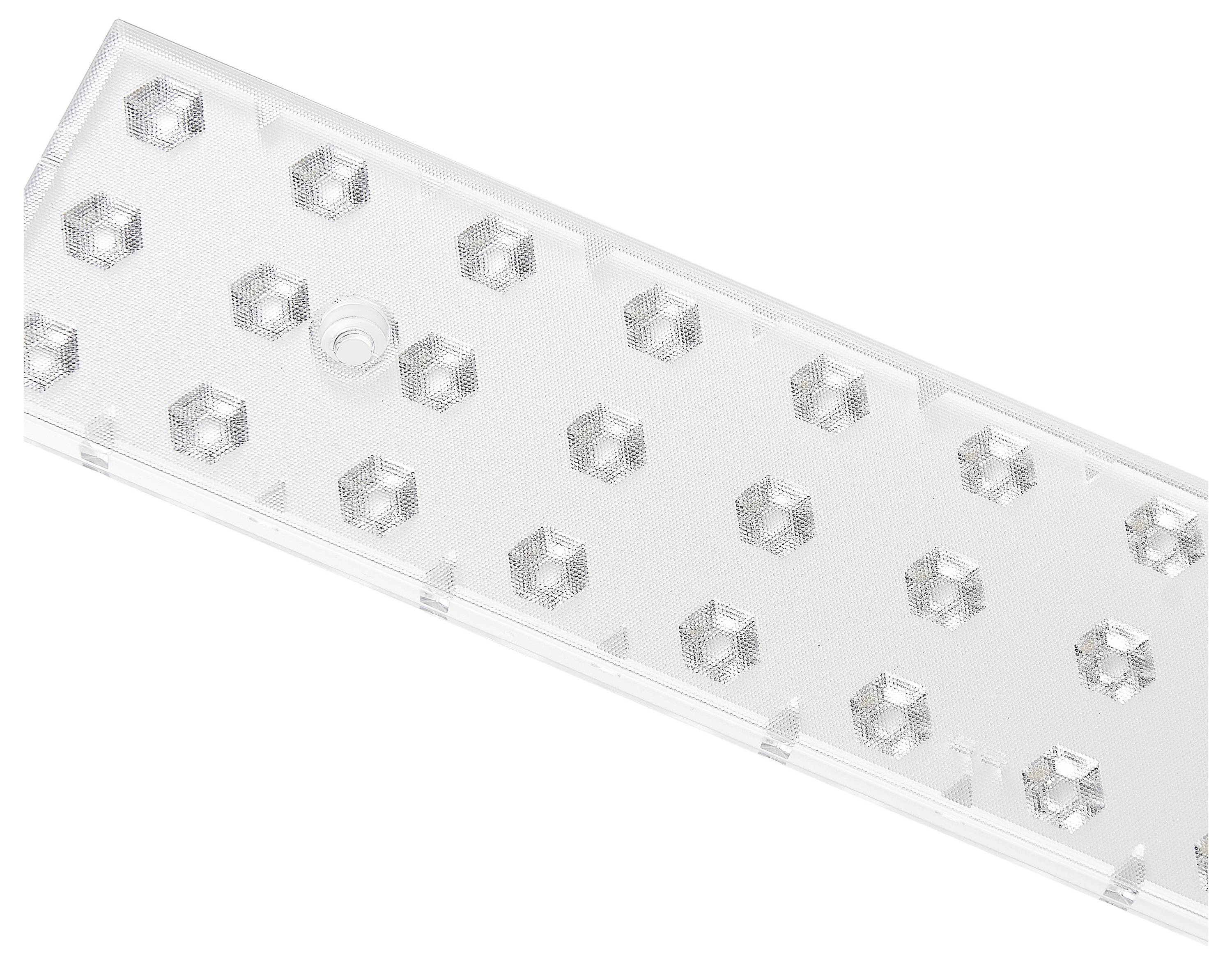 Ein rechteckiges, transparentes Kunststoffteil mit erhobenen, sechseckigen Mustern darauf.