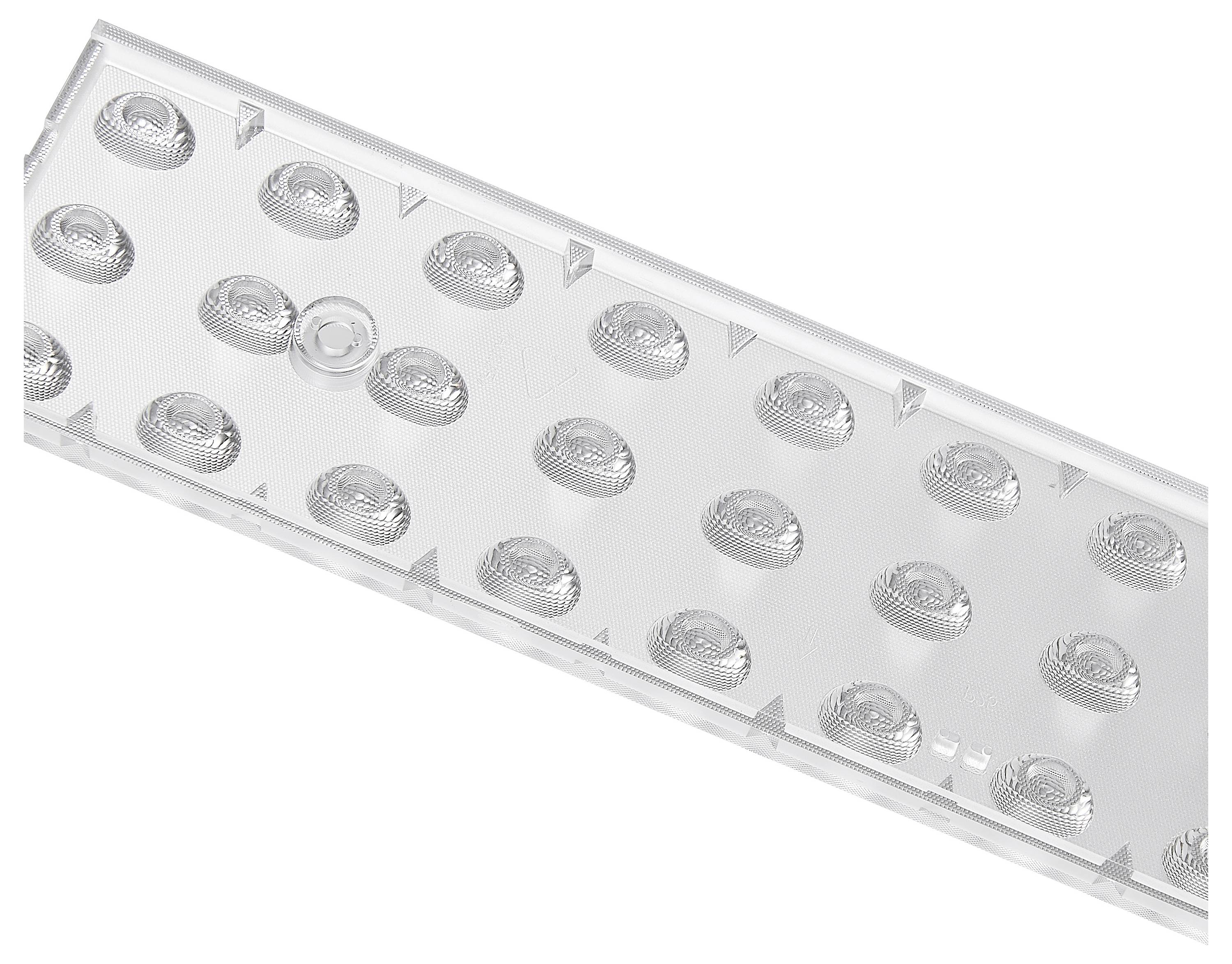 Durchsichtige Kunststoffplatte mit mehreren runden Linsen in gleichmäßiger Anordnung.