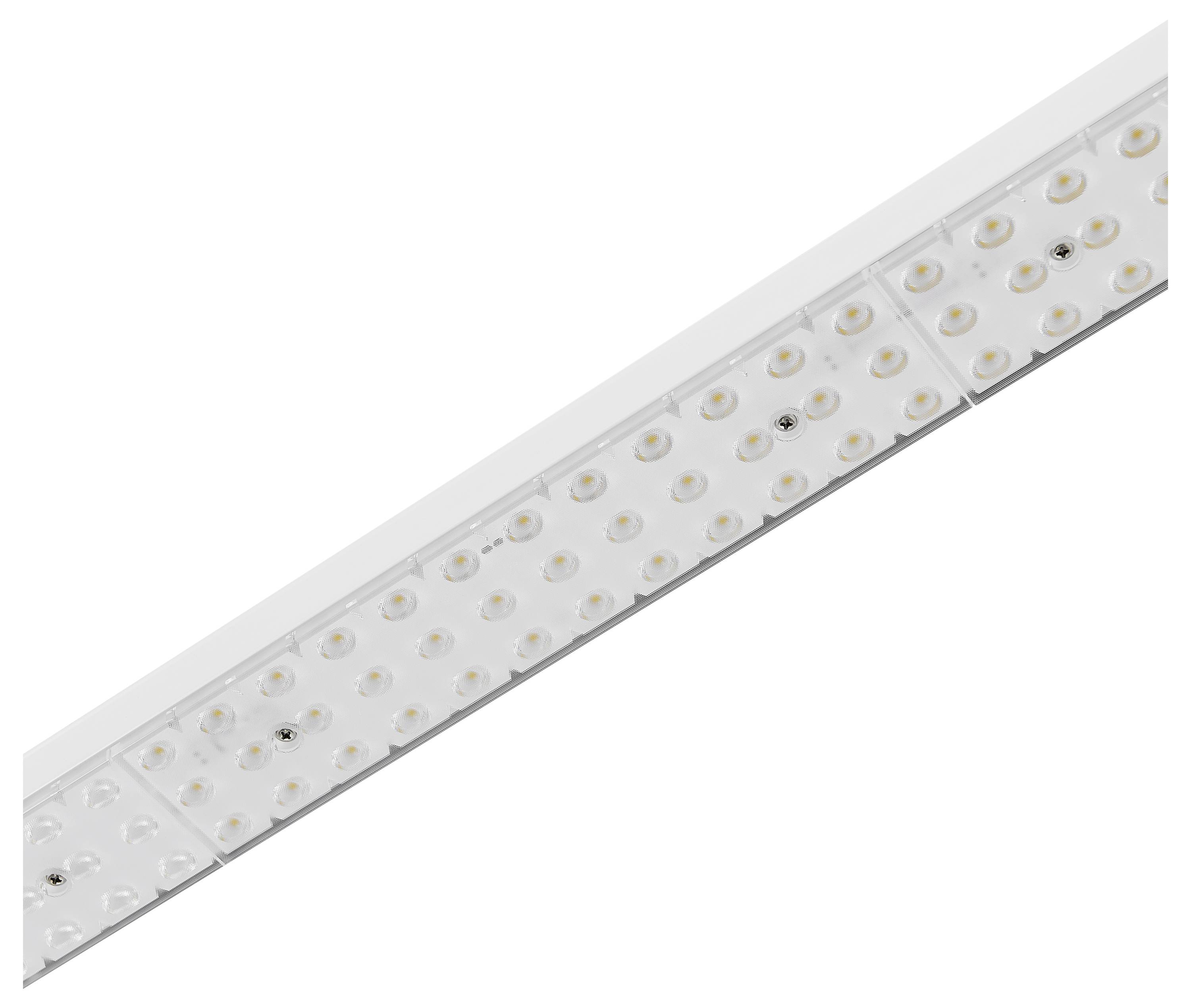 Nahaufnahme einer LED-Lichtleiste mit mehreren kleinen, in einem regelmäßigen Muster angeordneten Lichtern auf einer weißen Oberfläche.