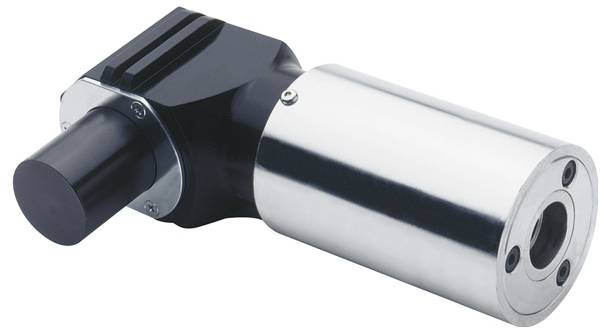 Eine Nahaufnahme eines Metallmaschinenbauteils mit einem zylindrischen Abschnitt und einem schwarzen rechteckigen Anhang an der Seite, möglicherweise eine Motor- oder Werkzeugkomponente.