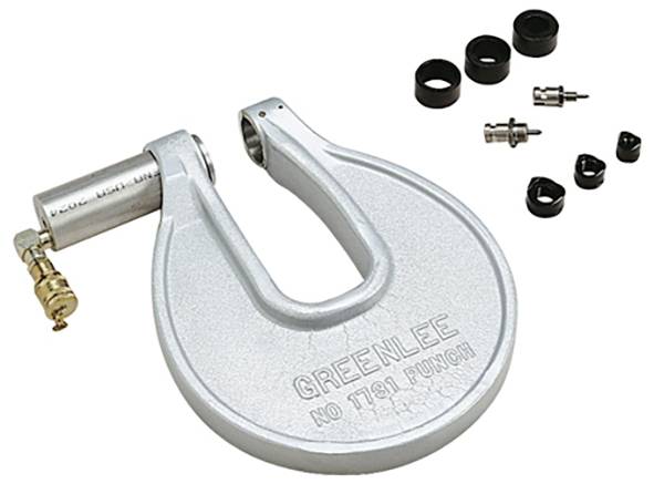 Metallstanzwerkzeug mit der Aufschrift 'GREENLEE NO 7310', ausgestattet mit verschiedenen schwarzen Matrizen und Komponenten, das für das präzise Schneiden von Löchern in unterschiedlichen Materialien verwendet wird.