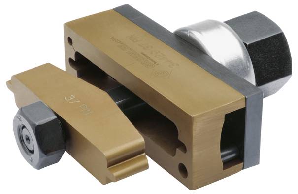 Ein mechanisches Werkzeugbauteil mit bronzefarbener Oberfläche, das einen Bolzen an der Vorderseite und eine große sechseckige Mutter an der Oberseite aufweist und in industriellen Umgebungen eingesetzt wird.