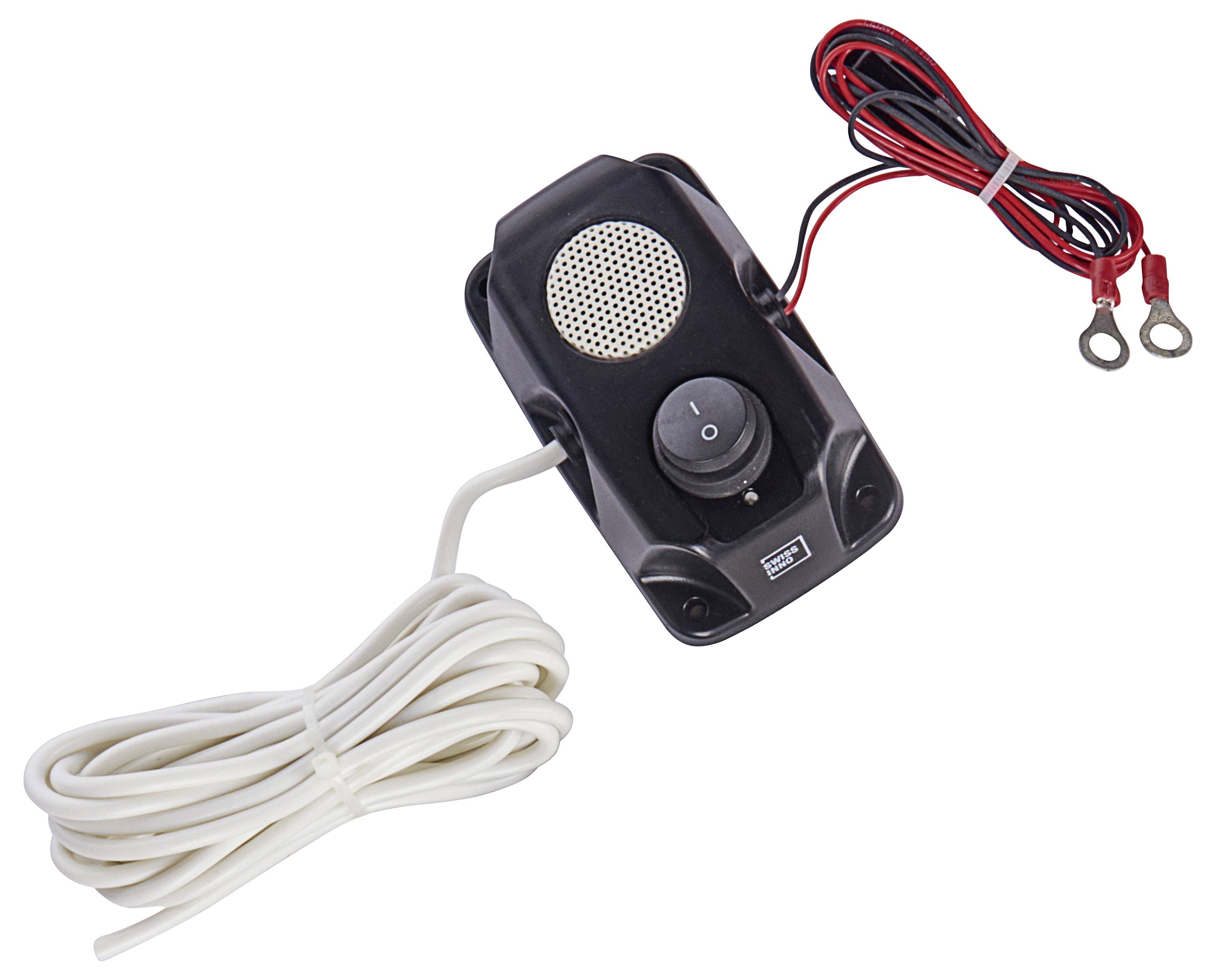 Eine schwarze elektronische Sirene mit Lautsprecher und Schalter, verbunden mit roten und schwarzen Kabeln und einem gespulten weißen Kabel, verwendet für Warnhinweise.