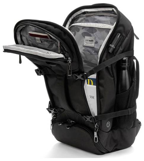 Geöffneter schwarzer Rucksack mit mehreren Reißverschluss-Fächern. Im Inneren befinden sich ein Buch, eine Wasserflasche und ein elektronisches Gerät. Geeignet für Reisen oder den Schulalltag.