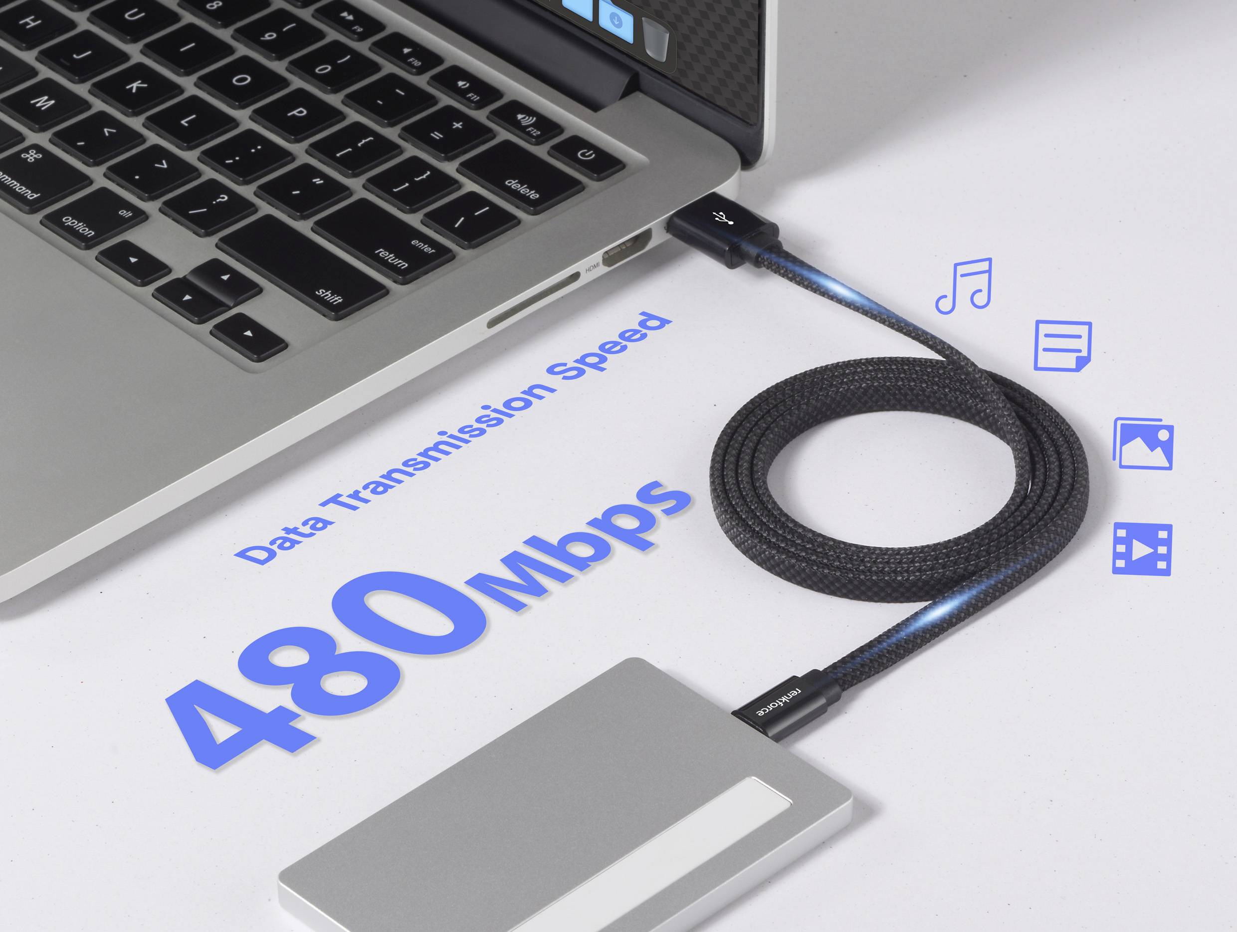 Ein Laptop, der über ein Kabel mit einer externen Festplatte verbunden ist, wird gezeigt, wobei 'Datenübertragungsgeschwindigkeit 480 Mbps' hervorgehoben wird, mit Symbolen für Musik, Fotos und Video.