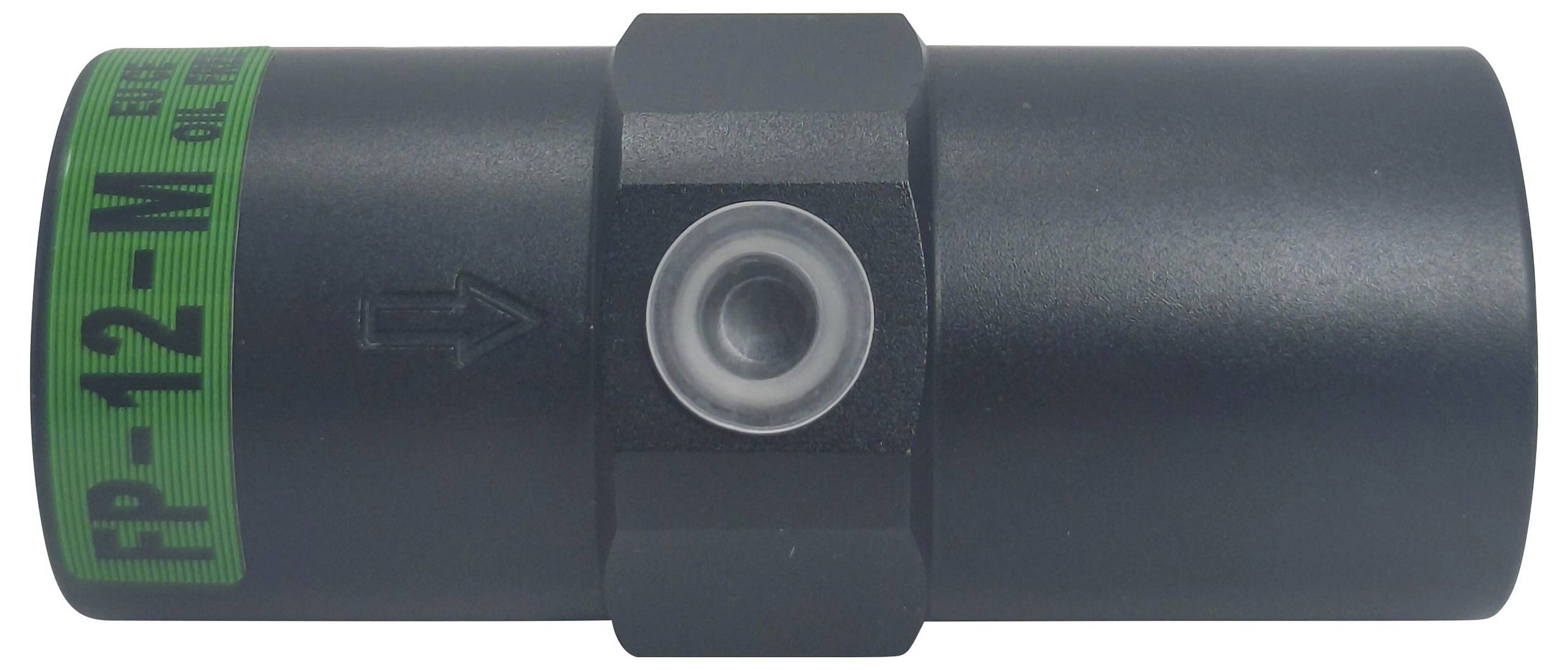 Ein schwarzes zylindrisches Objekt mit einem grünen Etikett, auf dem 