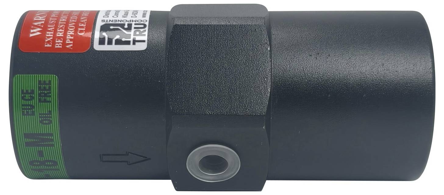 Ein schwarzes zylindrisches mechanisches Teil mit einem sechseckigen Zentrum und roten und grünen Warnhinweisen.