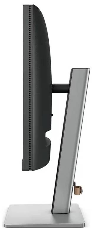 Eine Seitenansicht eines modernen, dünnen Computermonitors auf einem Metallfuß, die den schlanken Umriss und das minimalistische Design zeigt.