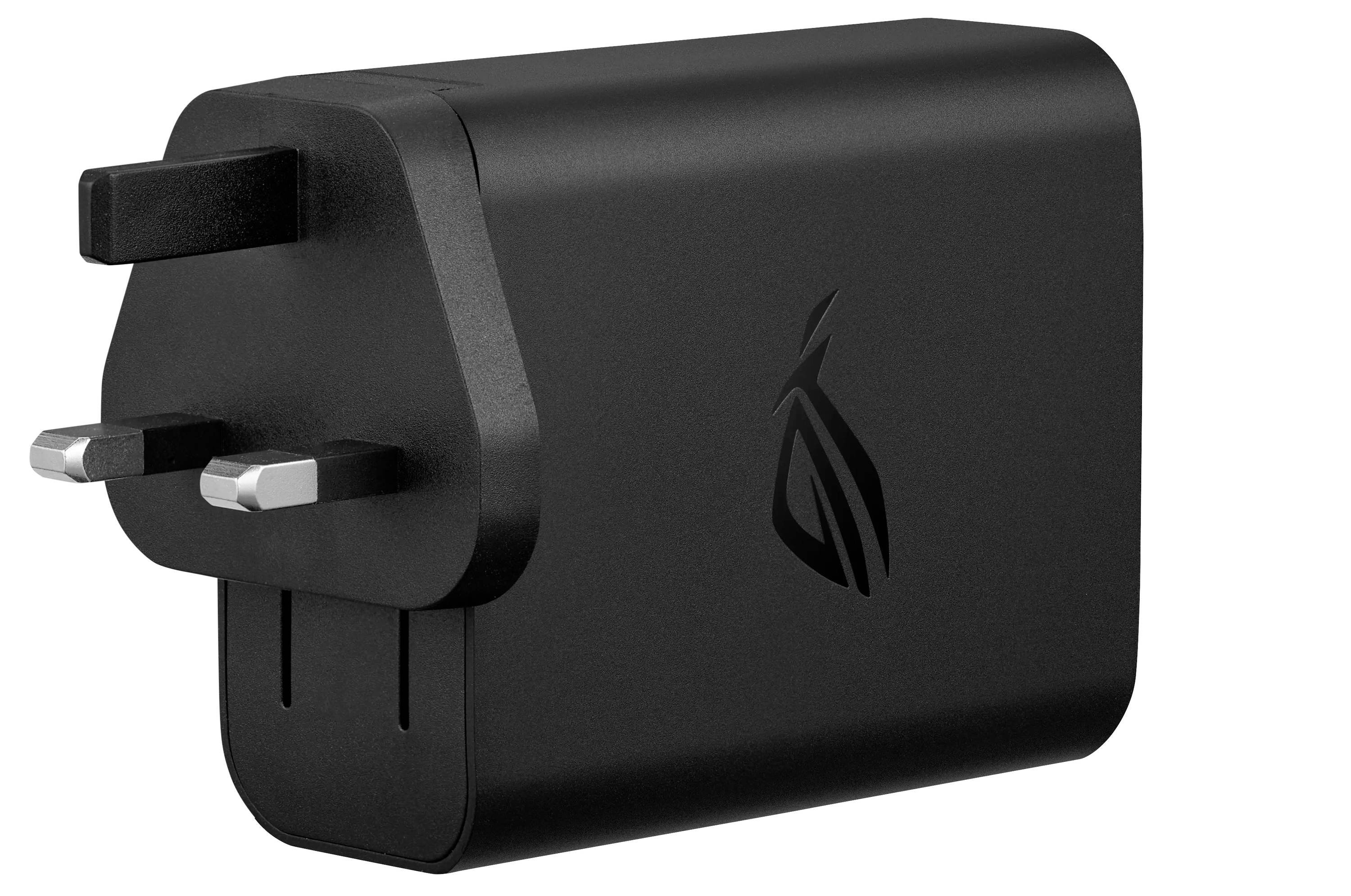 Ein schwarzes Wandladegerät mit einem UK-Stecker und einem stilisierten Flammenlogo wird gezeigt, das üblicherweise zum Laden elektronischer Geräte verwendet wird.