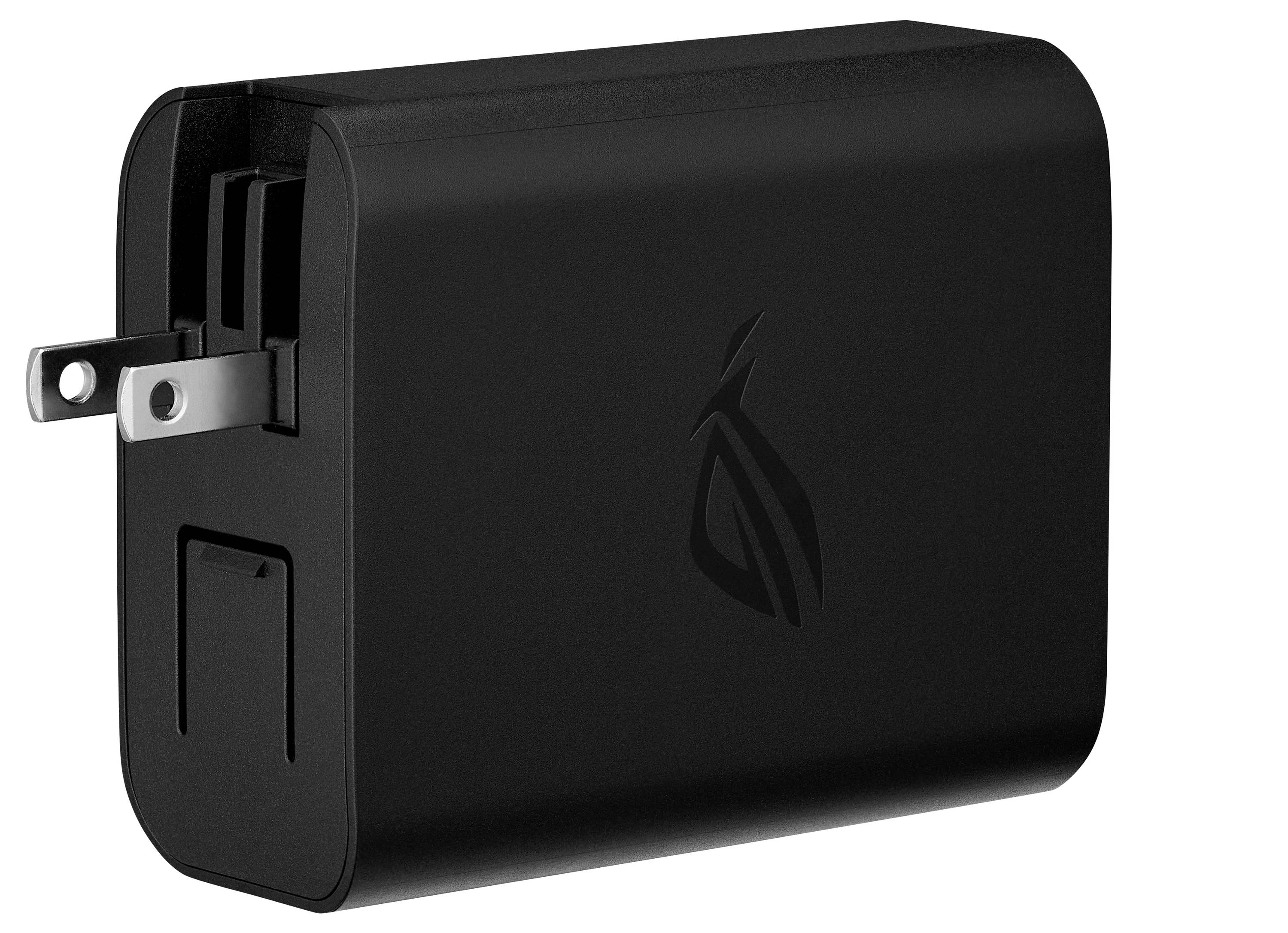 Ein schwarzes elektrisches Ladegerät mit zusammenklappbaren Steckern, das ein Logo an der Seite trägt. Geeignet zum Aufladen oder Stromversorgen elektronischer Geräte.