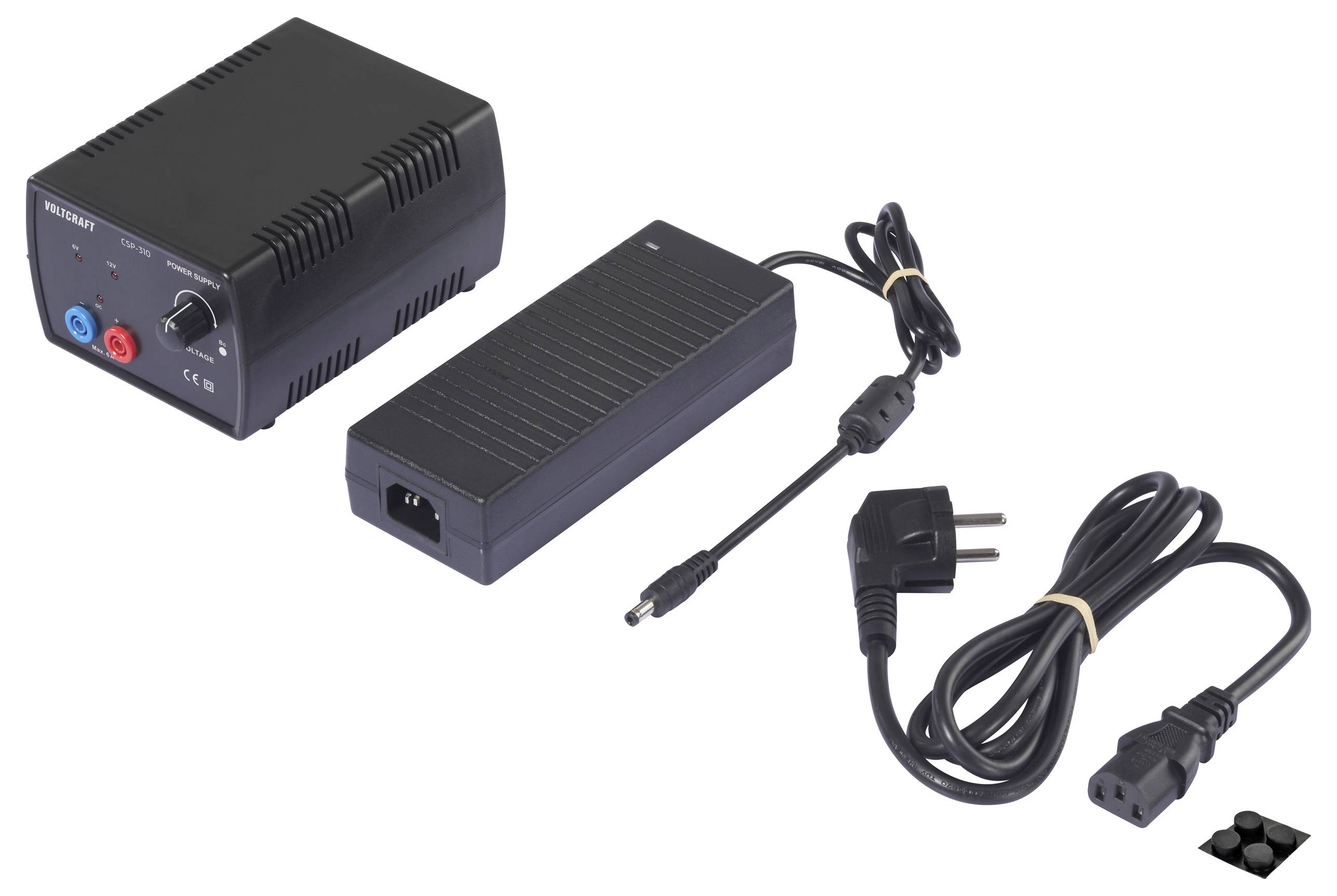 Eine Stromversorgung und ein Adapter mit Kabeln, mit einem US-Stecker ausgestattet, bereit für die Verbindung elektronischer Geräte.