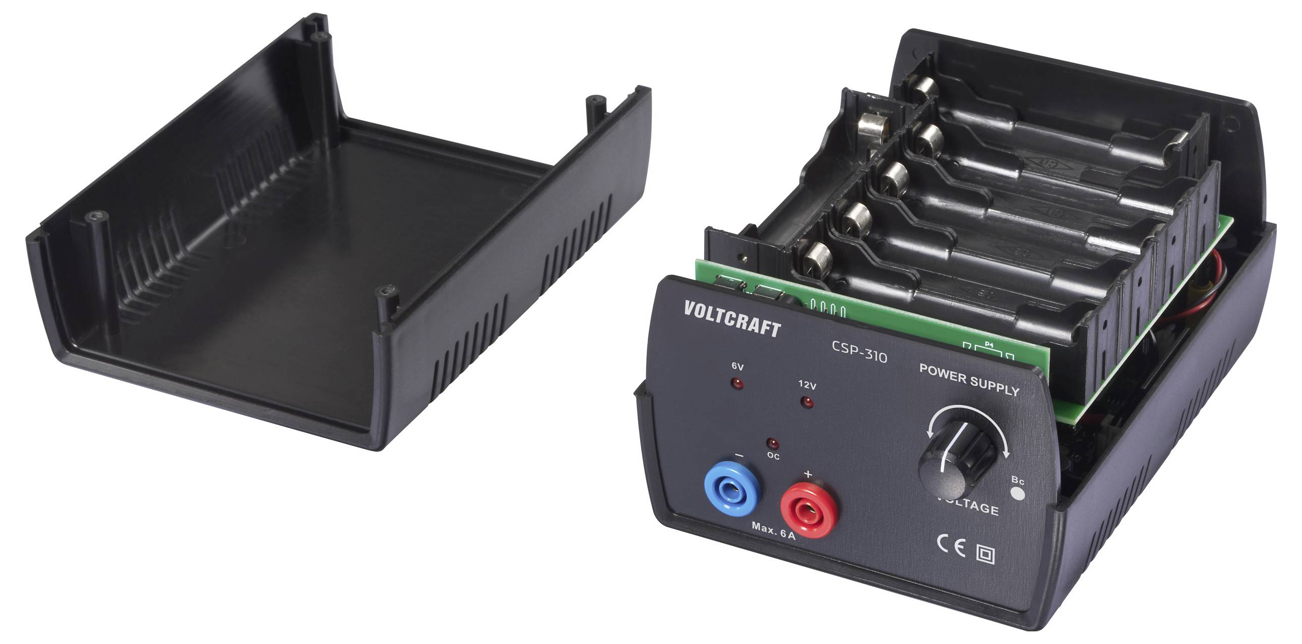 Ein Voltcraft CSP-310 Netzteil mit offener Kunststoffgehäuse, das mehrere Batteriezugänge, einen Leistungsregler und rote und blaue Anschlüsse zeigt.