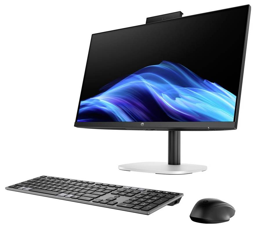 Eine moderne Desktop-Computer-Einrichtung mit einem schlanken Monitor, der ein blaues Wellenmuster zeigt, einer drahtlosen Tastatur und einer Maus auf einer weißen Oberfläche.