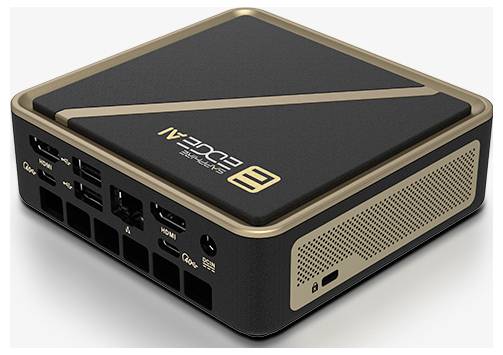 Ein kompaktes schwarzes und goldenes Computergerät mit mehreren Anschlüssen an der Seite, mit der Aufschrift 