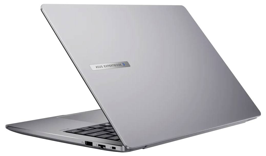 Ein schlanker, silberner Laptop, halb geöffnet, mit USB-Anschlüssen an der Seite und einer Tastatur. Der Deckel ist mit der Marke 'ASUS ZenBook' versehen.
