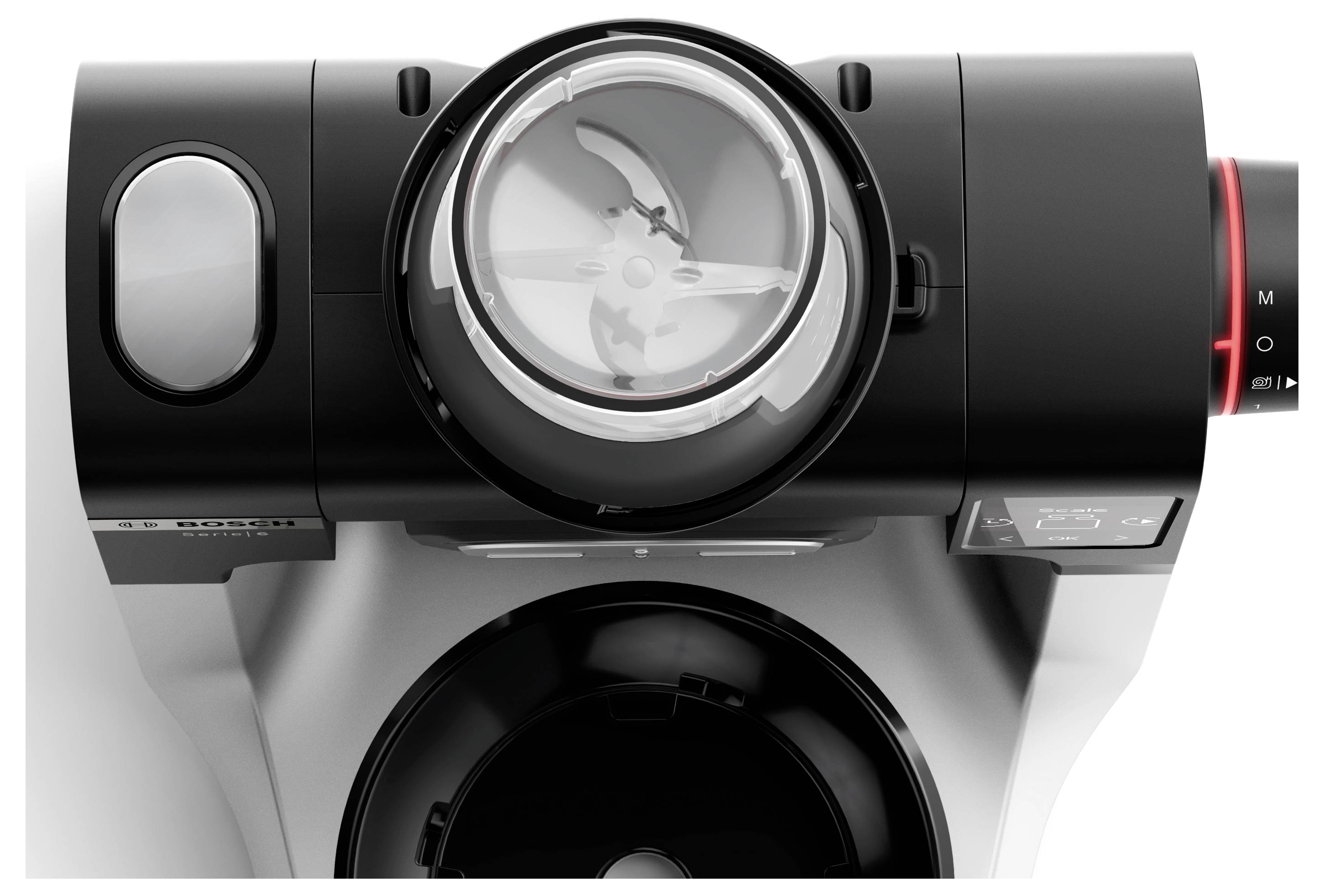 Eine Draufsicht eines modernen Kaffeemachers zeigt einen durchsichtigen Deckel, der einen Blick auf den inneren Mechanismus freigibt. Die Maschine verfügt über Leistungs- und Steuerungsdrehregler.