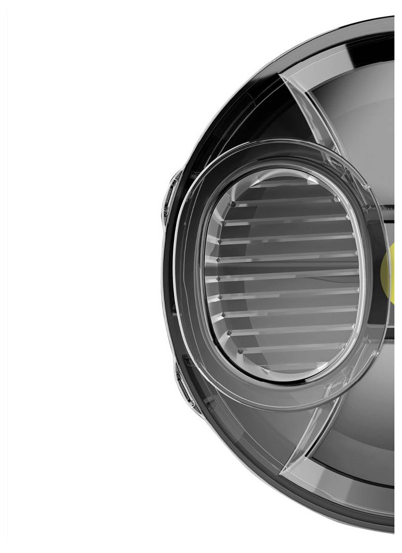 Nahaufnahme eines eleganten, modernen Autoscheinwerfers, der seine klare Linse, reflektierende Oberflächen und komplexe Innenkomponenten präsentiert.