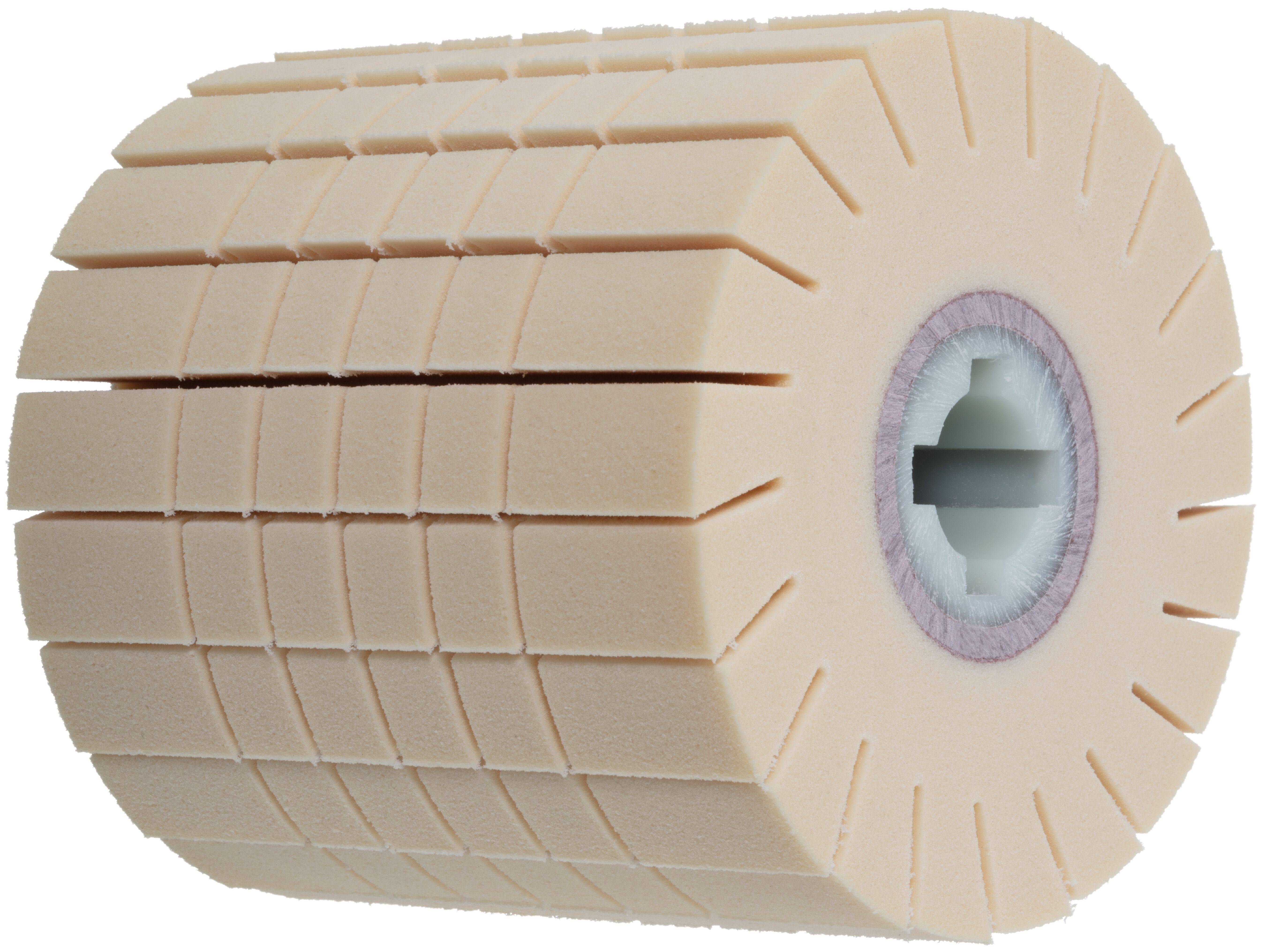 Ein zylindrischer, fleischfarbener Schleifstein mit segmentierten Rillen und einem zentralen weißen Kern, der für industrielle Polierarbeiten verwendet wird.